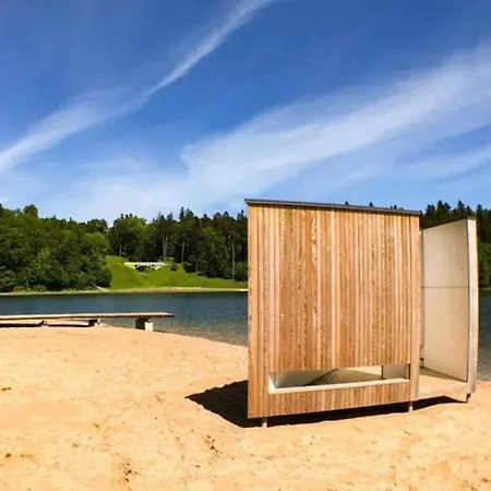 Апартаменты Bed&boat Two-story Boathouse On Lake+boat Алуксне